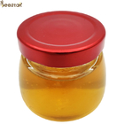 100% καθαρό φυσικό βιολογικό μέλι μελισσών μέλι σίνδρου με ξεχωριστή οσμή και χρώμα
