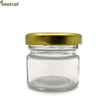 Αγορά 25ml τα βάζα μελιού γυαλιού συσσωρεύουν τα κενά μπουκάλια μελιού γυαλιού βάζων γυαλιού αποθήκευσης σε απευθείας σύνδεση κατασκευή